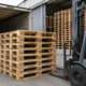 EPAL pallets being exchanged at a warehouse loading dock