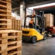 Warehouse loading export cargo using pallets meeting ISPM 15 pallet requirements EU with IPPC stamped wooden pallets