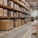 GMA standard wooden pallets stacked in an e-commerce fulfillment warehouse